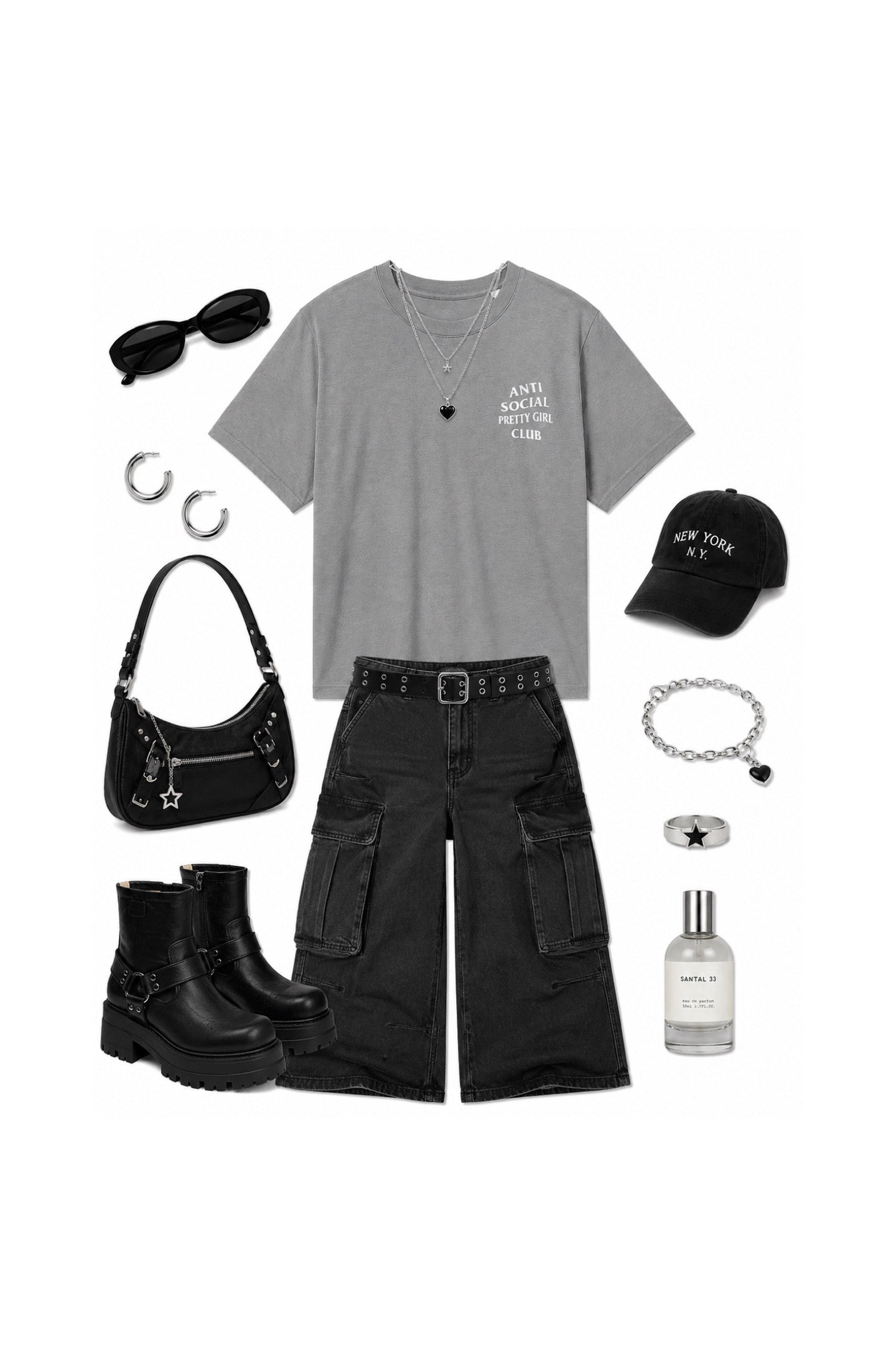 A flat-lay outfit arrangement on a white background featuring a heather gray graphic t-shirt, black cargo shorts, black combat boots, a black shoulder bag, black sunglasses, a black baseball cap, silver hoop earrings, a silver chain bracelet, a silver necklace, and a clear glass perfume bottle.