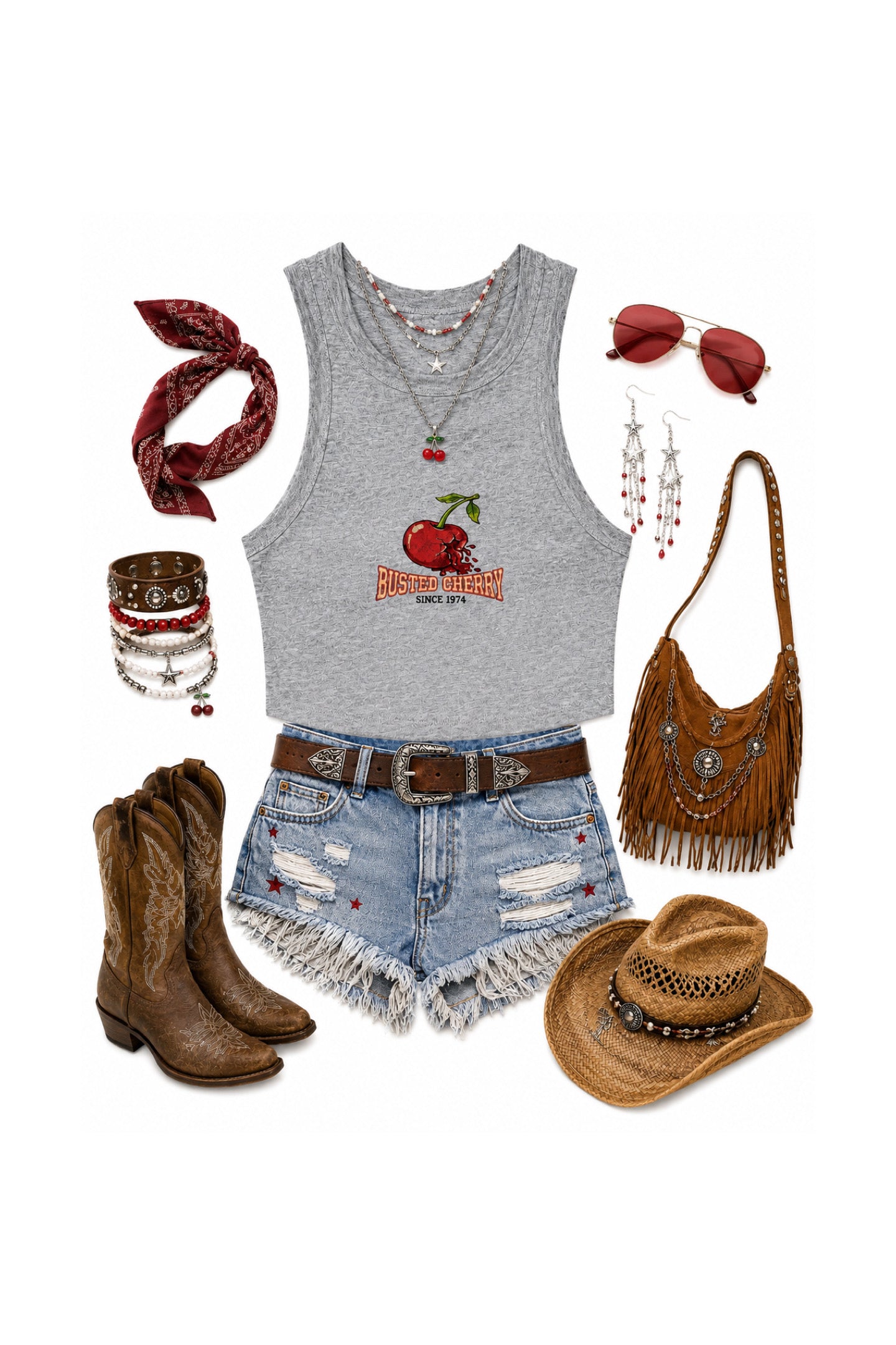 A flat-lay outfit arrangement featuring a heather gray sleeveless tank top with a red cherry graphic, distressed denim shorts, a brown belt, a brown fringed shoulder bag, cowboy boots, a brown hat, sunglasses, earrings, bracelets, and a red bandana on a white background.