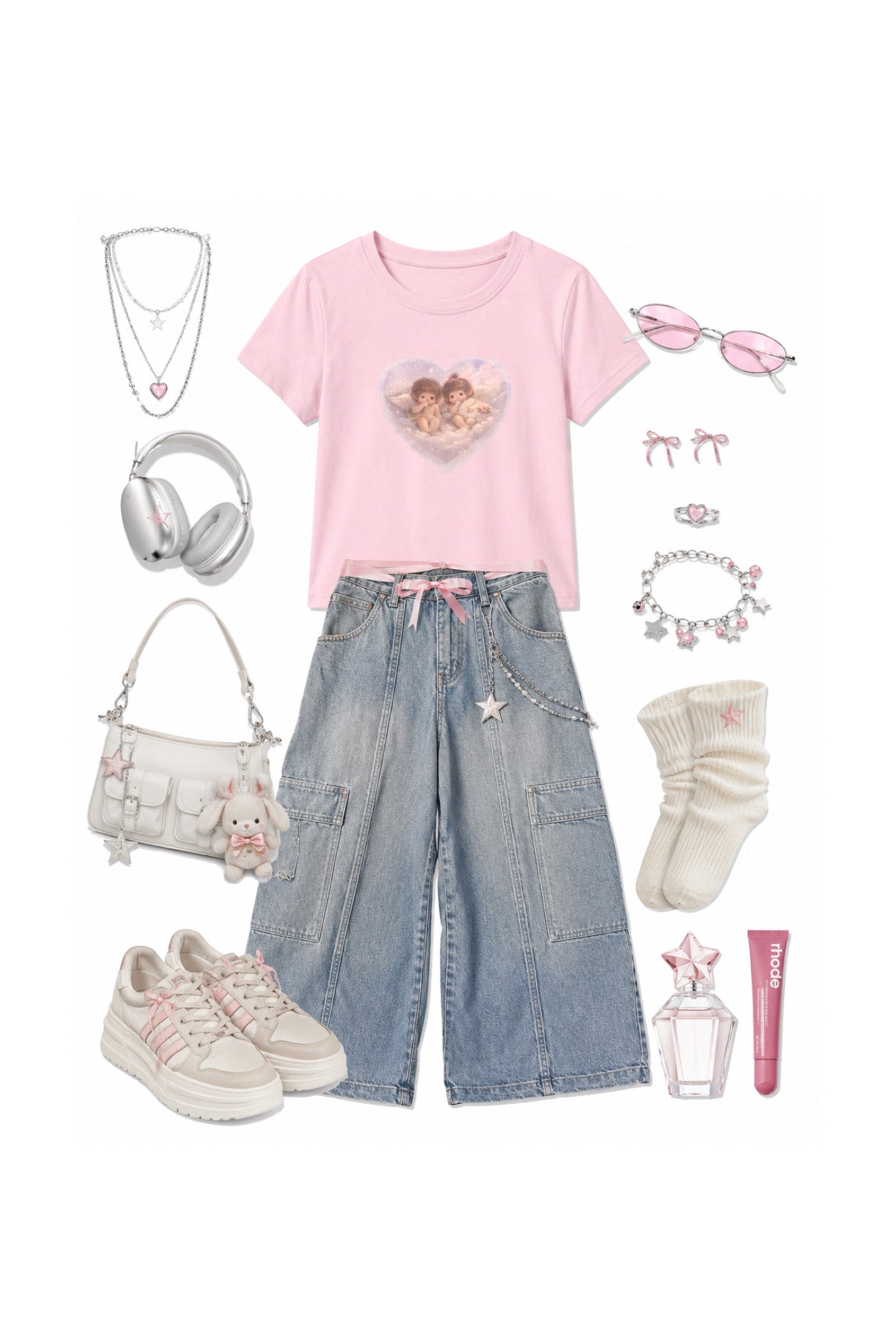 A styled flat lay of a girl's summer outfit featuring a light pink t-shirt with a heart graphic, light-wash denim cargo shorts, and white sneakers, surrounded by accessories like headphones, a handbag, sunglasses, and jewelry on a white background.